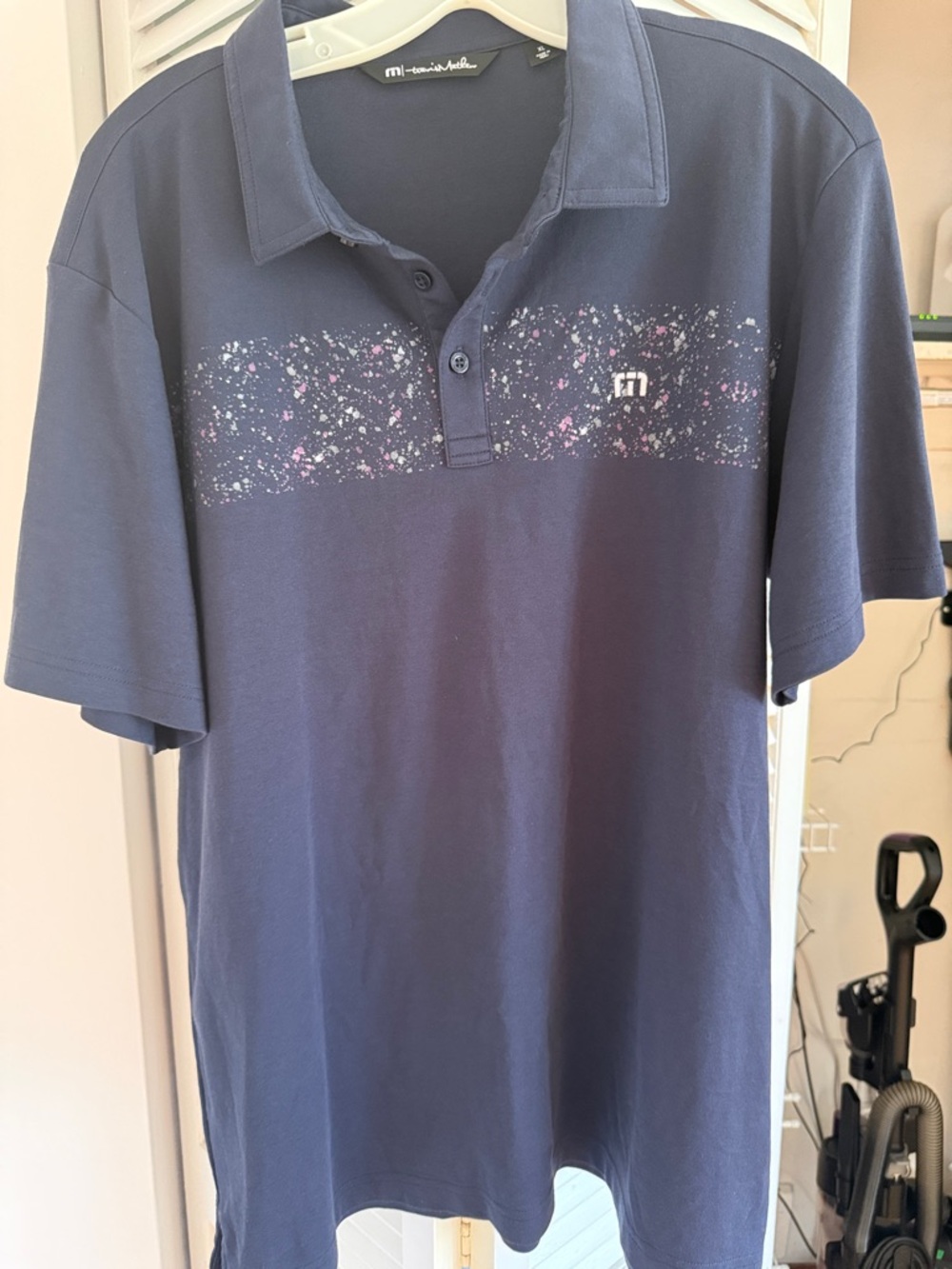 Travis Mathew Navy Polo with Speckle Chest Print